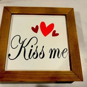 Kiss me home decor sign.